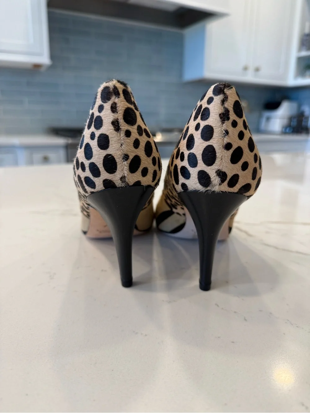 Carolinna Espinoso Embossed Zebra-Print Pointed Pumps in Tan and Black